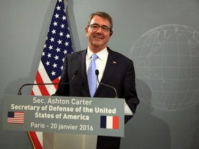 U.S Defense Secretary Ashton Carter addresses media during a press conference, after a meeting at the defense minister residence in Paris, Wednesday, Jan 20, 2016. Defense Secretary Ash Carter said Wednesday that defense ministers from France and five other nations have agreed to intensify the campaign against Islamic State militants in Iraq and Syria, and that the coalition will work together to fill the military requirements as the fight unfolds over the coming months. (AP Photo/Thibault Camus)