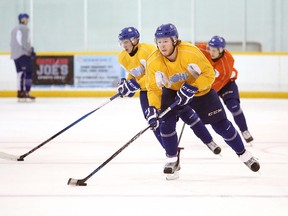 Sudbury Wolves forward Patrick Murphy runs through a drill during team practice in Sudbury, Ont. on Thursday January 21, 2016.