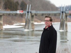 Mike Bloxam, who chairs city hall?s advisory committee on the environment, stands near the broken Springbank Dam in London?s Springbank Park. (CRAIG GLOVER, The London Free Press)