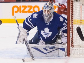 Toronto Maple Leafs goaltender James Reimer makes a save during third period NHL hockey action against Carolina Hurricanes in Toronto on Jan. 21, 2016. (THE CANADIAN PRESS/Chris Young)