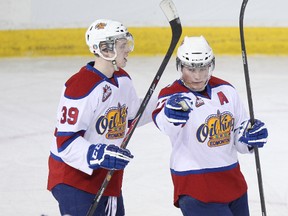 Brett Pollock and Curtis Lazar celebrate a goal in 2014 while Lazar was still a member of the Oil Kings. (File)