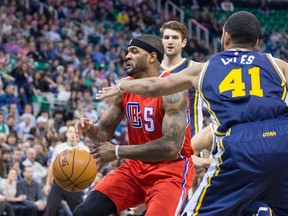 Los Angeles Clippers center Josh Smith (5) attempts a shot while defended by Utah Jazz forward. Rob Gray-USA TODAY Sports
