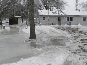 A home owned by Jack Sobanski on Cooke Armstrong Road, north of Frankford, is surrounded by ice after the Trent River overflowed Wednesday. Lower Trent Conservation has continued a flood watch for the area for the weekend.  Ernst Kuglin/The Intelligencer