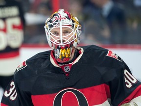 Ottawa Senators goalie Andrew Hammond (30) prior to the start of the second period against the Vancouver Canucks at Canadian Tire Centre. The Senators defeated the Canucks 3-2. Marc DesRosiers-USA TODAY Sports
