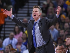 Golden State Warriors head coach Steve Kerr argues with an official during the second quarter against the San Antonio Spurs at Oracle Arena. The Spurs defeated the Warriors 113-100. Kyle Terada-USA TODAY Sports