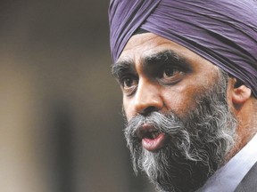 Defence Minister Harjit Sajjan has suggested Canada could do more in fight against ISIL using our intelligence capability. (Chris Wattie/Reuters)