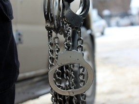 Kingston Police Stock photos  in Kingston, Ont. on Thursday January 21, 2016. Steph Crosier/Kingston Whig-Standard/Postmedia Network cuffs, prisoner, lock up