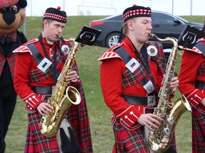 Honoured guests were ushered in by the Queen's band and football team at the new Richardson Stadium's ceremonial ground-breaking in Kingston, Ont. on Saturday December 5, 2015. Steph Crosier/Kingston Whig-Standard/Postmedia Network