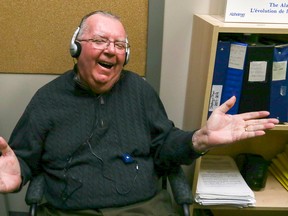 Luke Hendry/The Intelligencer
John Watts smiles as he tries out an Alzheimer Society iPod at the society's Hastings-Prince Edward branch in Belleville Friday. The agency has begun loaning the music players to clients, giving people with dementia some musical therapy and their caregivers a bit of a break.