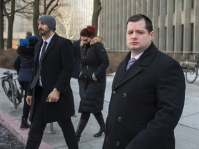 Const. James Forcillo leaves the courthouse at at 361 University Ave. at around noon in Toronto, Ont.  on Thursday January 21, 2016. Ernest Doroszuk/Toronto Sun/Postmedia Network