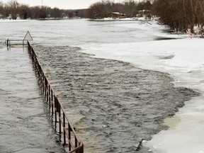 A view of the Otonabee River below Lock 19 south of Lansdowne St. on Friday January 22, 2016 in Peterborough, Ont. Parks Canada issued an advisory Friday, stating: 'Frazil ice is a slush-like substance formed by the accumulation of ice crystals in water that is moving too fast for it to freeze. Elevated water levels and flows resulting from rainfall and snowmelt, combined with the recent extreme drop in temperatures, have caused frazil ice to form on parts of the Trent-Severn Waterway. Frazil ice can cause the blocking of narrow sections of the canal and can result in localized flooding.' Clifford Skarstedt/Peterborough Examiner/Postmedia Network