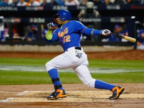 Yoenis Cespedes of the New York Mets bats against the Kansas City Royals during Game Five of the 2015 World Series at Citi Field on November 1, 2015.  (Al Bello/Getty Images/AFP)