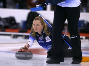 Chelsea Carey delivers a rock during Friday's game against Shannon Kleibrink in Calgary. (Jim Wells)