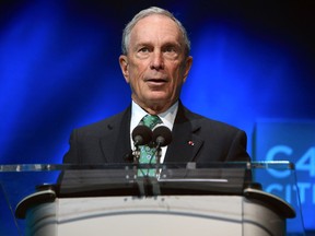 In this Dec. 3, 2015, file photo, former New York Mayor Michael Bloomberg speaks during the C40 cities awards ceremony, in Paris. Bloomberg is taking some early steps toward launching a potential independent campaign for president. That's according to three people familiar with the billionaire media executive's plans. They spoke on condition of anonymity because they weren't authorized to speak publicly for Bloomberg. (AP Photo/Thibault Camus, File)