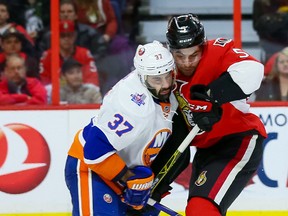 New York Islanders defenceman Brian Strait slows down Senators blue-liner Cody Ceci on Jan. 22 at the CTC. (Errol McGihon/Ottawa Sun)