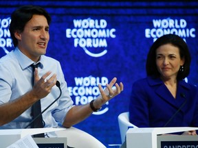 Prime Minister Justin Trudeau and Sheryl Sandberg, Chief Operating Officer of Facebook attends the annual meeting of the World Economic Forum (WEF) in Davos, Switzerland January 22, 2016. (REUTERS/Ruben Sprich)