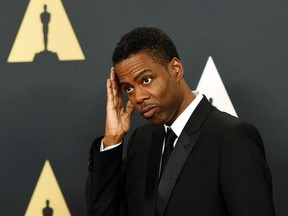 Comedian Chris Rock poses during the Academy of Motion Picture Arts and Sciences Governors Awards in Los Angeles, California November 8, 2014.  (REUTERS/Kevork Djansezian)