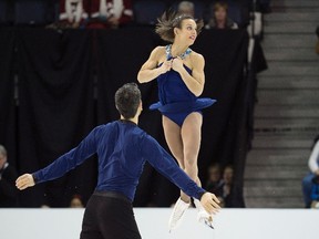 Meagan Duhamel, right, and Eric Radford perform their senior pairs free program during the Canadian Figure Skating Championships in Halifax on Saturday, January 23, 2016. Darren Calabrese/The Canadian Press