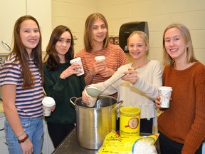 Supplied photo
Grade 8 students at Alexander Public School sell hot chocolate to support their goal of raising $10,000 to build a school in Ecuador. Students include, from left, Bradie Roy, Anna Teolis, Shannon Clarke, Meredith Kusniercyzk and Anne-Marie Sakki.