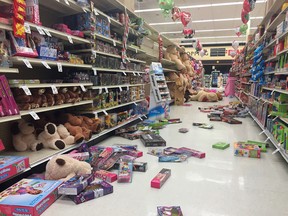 In this photo provided by Vincent Nusunginya, items fallen from the shelves litter the aisles inside a Safeway grocery store following a magnitude 6.8 earthquake on the Kenai Peninsula on Sunday Jan. 24, 2016, in south-central Alaska. (Vincent Nusunginya via the AP)