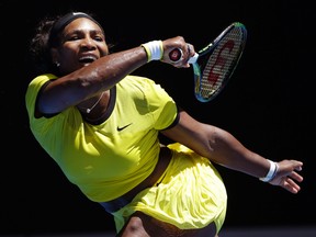 Serena Williams of the United States hits a forehand return Margarita Gasparyan of Russia during their fourth round match at the Australian Open tennis championships in Melbourne, Australia, Sunday, Jan. 24, 2016.(AP Photo/Aaron Favila)