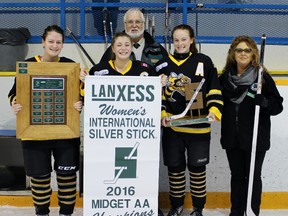 The Sarnia Lady Sting won the midget 'AA' championship at the Sarnia girl's Silver Stick finals with a 4-2 victory over Oakville at Clearwater Arena on Sunday, Jan. 24, 2016 in Sarnia, Ont. From left are Claire Vandeneynde, Nicole Rogers, tournament director Bryan Chappell, Kristin Parkes, and tournament representative Kelly Finch. (Terry Bridge, The Observer)