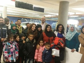 The Khalaf family, with 11 children between the ages of five and 20, has been welcomed to Edmonton by members of the Riverbend United Church. (SUPPLIED)