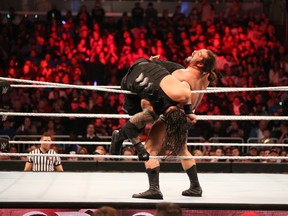 Rusev attempts to eliminate WWE World Heavyweight champion Roman Reigns during the Royal Rumble on Sunday night at the Amway Center in Orlando, Fla. Triple H would eventually win the Rumble. (Photo courtesy of World Wrestling Entertainment)