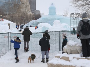 People look in as preparations for the first Great Ice Show continue at The Forks on Sun., Jan. 24, 2016. The show opens Monday. Kevin King/Winnipeg Sun/Postmedia Network