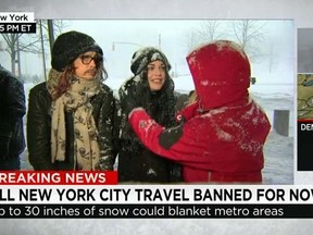 Aerosmith frontman Steven Tyler and his daughter Mia, 37, were braving the heavy snow when they came across CNN reporter Poppy Harlow on the streets of the Big Apple. (CNN screengrab)