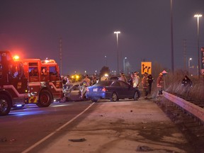 Emergency crews at the scene of a two-vehicle collision in the eastbound lanes of Hwy. 403 in Mississauga near East Gate Pkwy. Jan. 24, 2016. (Andrew Collins/Special to the Toronto Sun)
