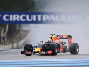 Red Bull driver Daniel Ricciardo, of Australia, steers his car during a testing session of Pirelli Formula One rain tyres, at the Paul Ricard circuit, in Le Castellet, near Marseille, southern France, Monday, Jan. 25, 2016. (AP Photo/Claude Paris)