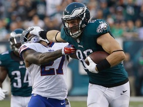 Philadelphia Eagles' Zach Ertz, right, breaks a tackle attempt by Buffalo Bills' Duke Williams during the second half of an NFL football game, in Philadelphia. (AP Photo/Michael Perez, File)