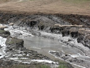 A Jeep makes it through the muck in the McLean Creek area in this 2009 file photo. (Postmedia Network)