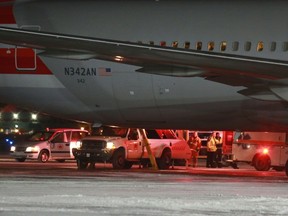 An American Airlines flight heading to Milan from Miami made an emergency landing in in St. John's, Newfoundland, onSunday, January 24, 2016. Ambulances were on hand and several passengers and crew were taken to hospital with unspecified injuries after their American Airlines flight encountered severe turbulence. THE CANADIAN PRESS/Paul Daly