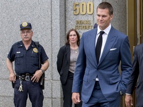 New England Patriots quarterback Tom Brady exits the Manhattan Federal Courthouse in New York, in this file photo taken August 31, 2015. (REUTERS/Brendan McDermid/Files)