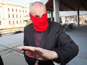 Graham James arrives at court for sentencing in Winnipeg on March 20, 2012. James, a former junior hockey coach who sexually abused players, has been granted day parole. THE CANADIAN PRESS/John Woods