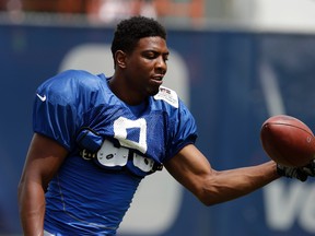 Indianapolis Colts' Duron Carter makes a catch during NFL football training camp Monday, Aug. 10, 2015, in Anderson, Ind. (AP Photo/Darron Cummings)