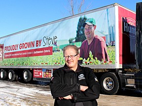 Gene Bushey, who drives truck for Wheels MSM Canada, has seen a positive reaction to the wrap on the trailer of his rig, promoting local farmers who grow tomatoes for ConAgra Foods, in Dresden, Ont., which are used in Hunt's and Aylmer canned tomatoes, which are among the many brands under the company's umbrella. Bushey is pictured here at his Pain Court, Ont. home on Saturday January 23, 2016. Ellwood Shreve/Chatham Daily News/Postmedia Network