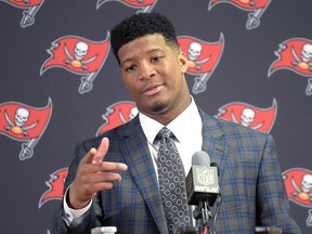 In this Dec. 27, 2015, file photo, Tampa Bay Buccaneers quarterback Jameis Winston (3) answers a question from a reporter during a post-game news conference after an NFL football game against the Chicago Bears, (AP Photo/Phelan M. Ebenhack, File)