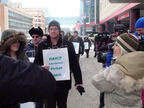 Bob Moroz, president of the Manitoba Association of Health Care Professionals, leads a lunchtime demonstration outside the Health Sciences Centre. MAHCP members are set to strike Jan. 31, 2015.