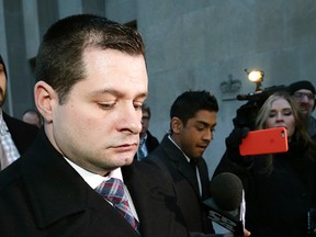 Toronto Police Const. James Forcillo leaves 361 University Ave courthouse after being found guilty of attempted murder in the 2013 shooting death of Sammy Yatim on Monday, January 25, 2016. (Craig Robertson/Toronto Sun)