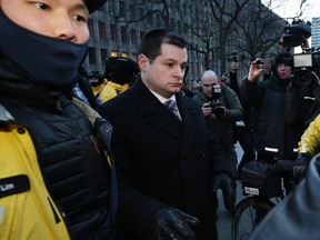 Toronto Police Const. James Forcillo leaves 361 University Ave. courthouse after being found guilty of attempted murder in the 2013 shooting death of Sammy Yatim on Monday, January 25, 2016. (Craig Robertson/Toronto Sun)