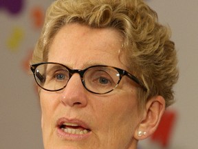 Ontario Premier and Liberal leader Kathleen Wynne speaks at St. Lawrence College in Kingston on Tuesday June 10 2014.  (IAN MACALPINE /KINGSTON WHIG-STANDARD/Postmedia Network)