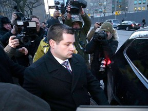 Toronto Police Const. James Forcillo leaves the courthouse after being found guilty of attempted murder in the 2013 shooting death of Sammy Yatim on Monday, January 25, 2016. (Craig Robertson/Toronto Sun/Postmedia Network)