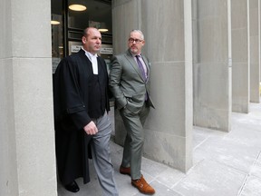 Peter Brauti, defence lawyer for Toronto Police Const. James Forcillo, and Mike McCormack, head of the police union, comment on the jury decision to convict Forcillo of attempted murder in the death of Sammy Yatim on Monday, January 25, 2016. (Michael Peake/Toronto Sun)