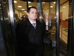 Toronto Police Const. James Forcillo leaves 361 University Ave. courthouse after being found guilty of attempted murder in the 2013 shooting death of Sammy Yatim on Monday, January 25, 2016. (Craig Robertson/Toronto Sun)