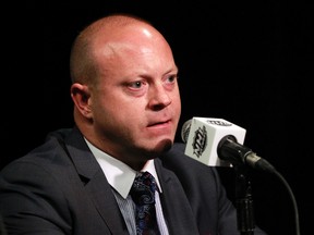 Chicago Blackhawks general manager Stan Bowman talks with media during media day the day before the 2015 Stanley Cup Final at Amalie Arena. Kim Klement-USA TODAY Sports