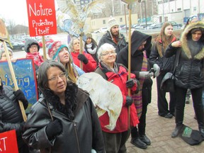 Anti-pipeline protesters hold signs on Tuesday, January 26, 2016 outside the courthouse in Sarnia, Ont. Three anti-pipeline activists appeared in court Tuesday to speak to charges of mischief stemming from an incident in December when an Enbridge oil pipeline valve site was occupied near Mandaumin Road in Sarnia. The next court appearance for the three activists is set for Feb. 23.
Paul Morden/Sarnia Observer/Postmedia Network