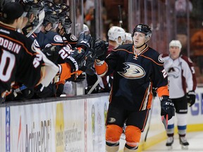 Anaheim Ducks' Shawn Horcoff celebrates his goal with teammates during a pre-season game against the Colorado Avalanche in Anaheim on Oct. 1, 2015. (AP Photo/Jae C. Hong)